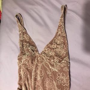 lavender bodysuit & black and white tube top